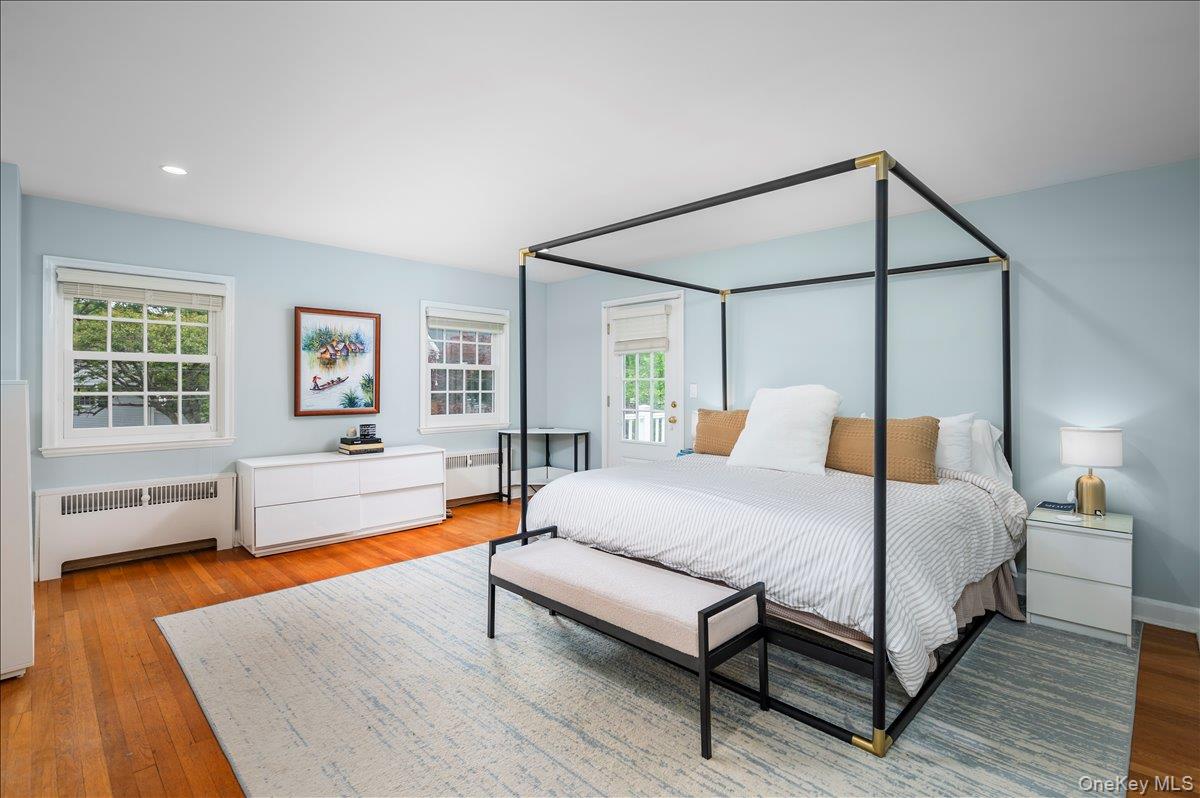 49 Eton Road Larchmont, NY 10538 - Photo 17 of 34 a bedroom with a bed and a couch