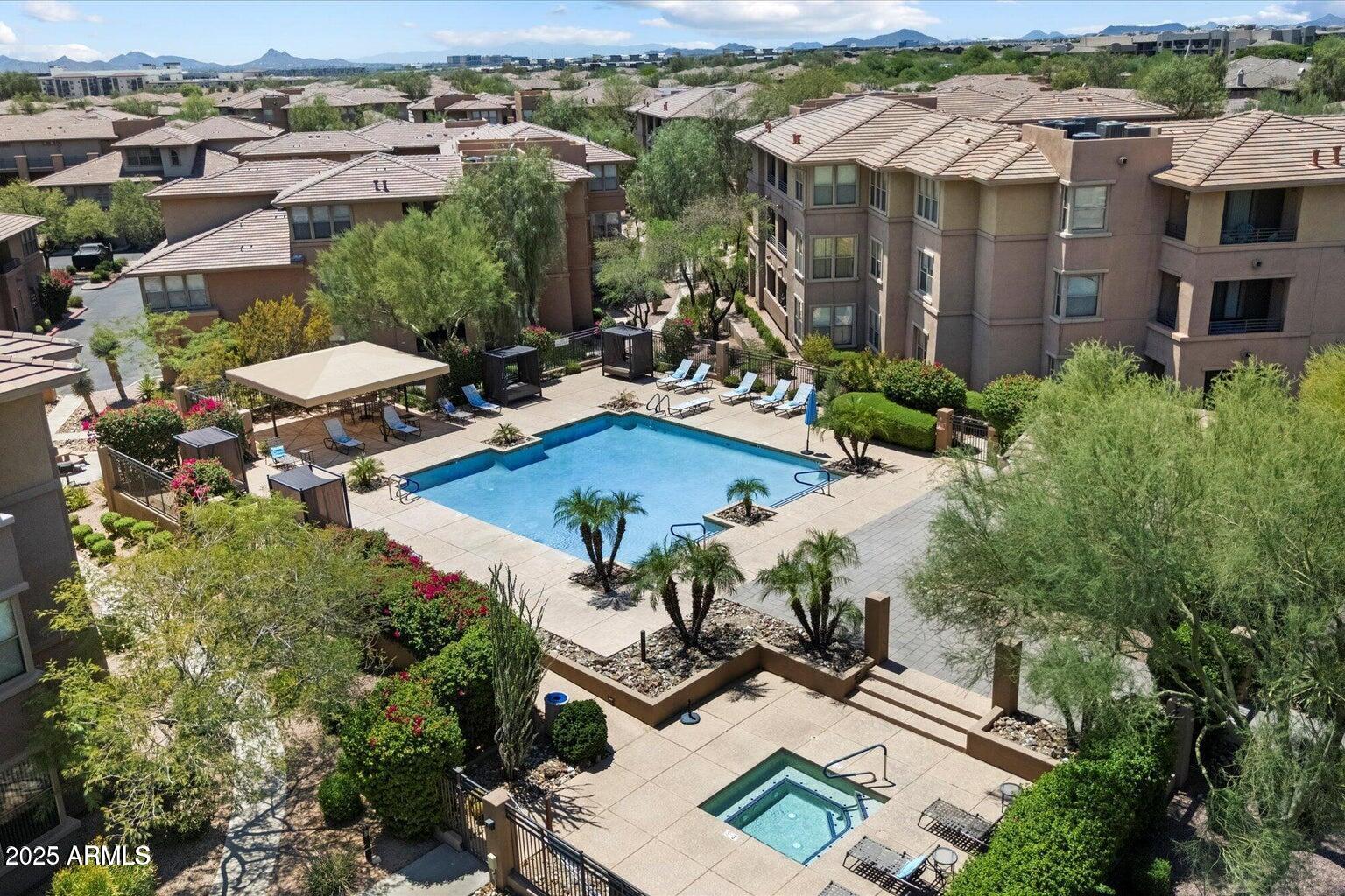 19777 North 76th Street, Unit 1229 Scottsdale, AZ 85255 - Photo 25 of 25 an aerial view of a house with swimming pool patio and outdoor seating