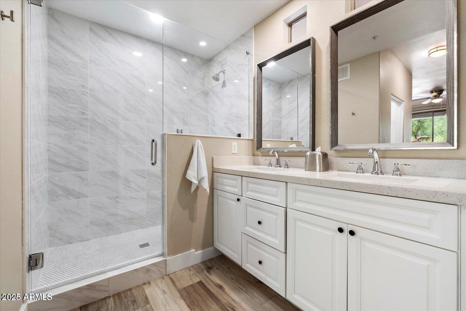 19777 North 76th Street, Unit 1229 Scottsdale, AZ 85255 - Photo 10 of 25 a bathroom with double sink and a mirror