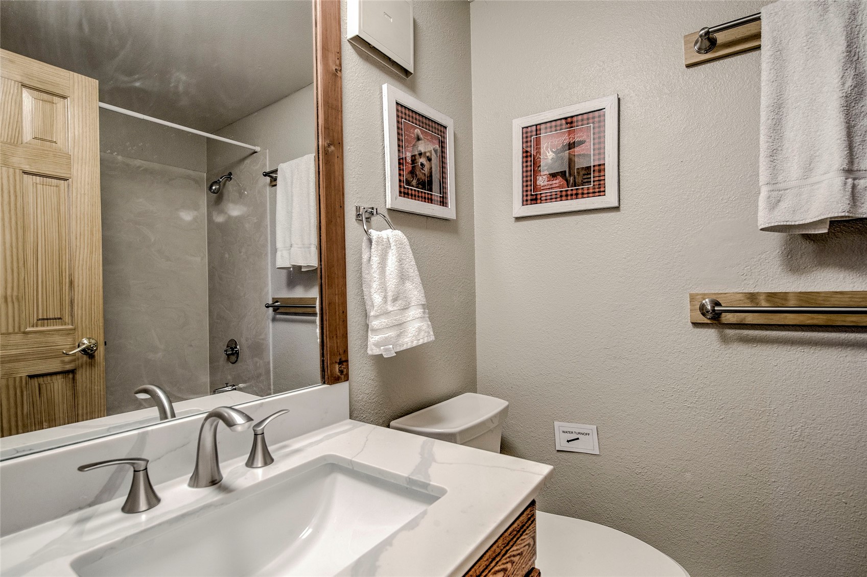 187 Fuller Placer Road, Unit B Breckenridge, CO 80424 - Photo 20 of 33 a bathroom with a sink toilet and shower