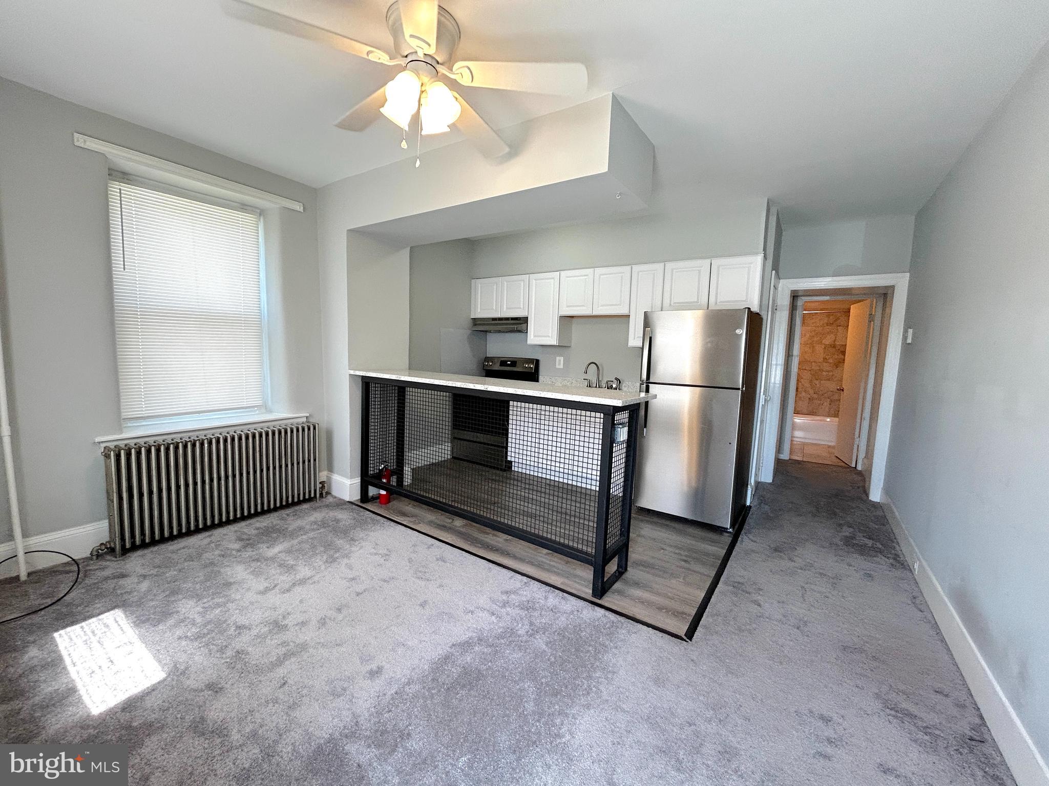 15 Level Road, Unit 5 Collegeville, PA 19426 - Photo 4 of 10 a view of a kitchen with a sink cabinets and window