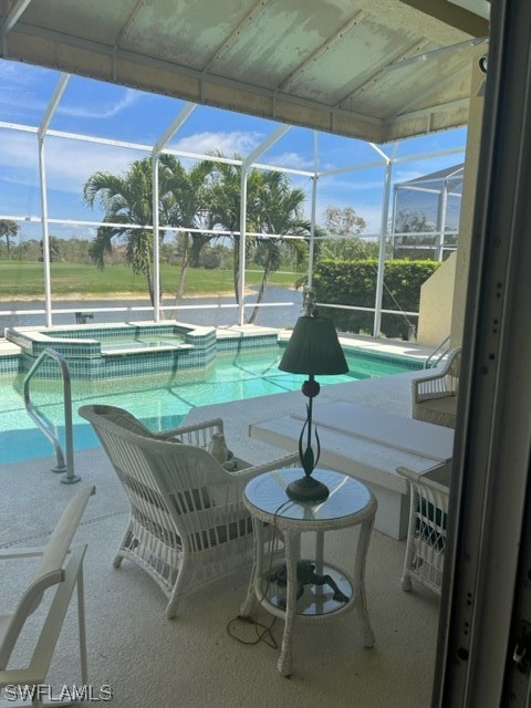 19391 Silver Oak Drive Estero, FL 33967 - Photo 22 of 24 a view of swimming pool with table and chairs