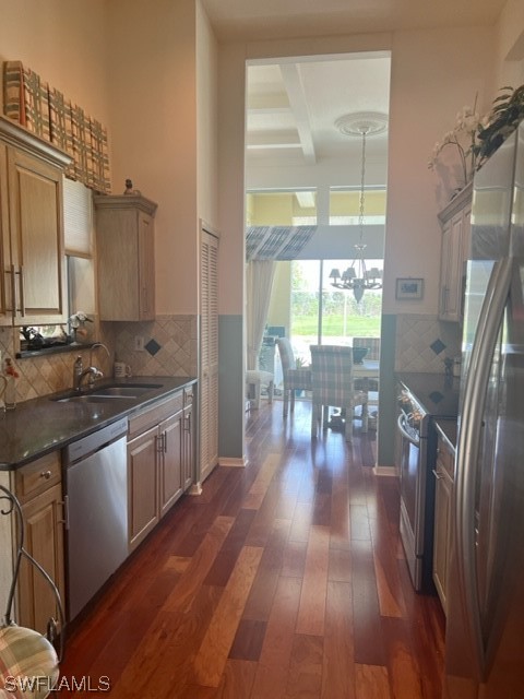 19391 Silver Oak Drive Estero, FL 33967 - Photo 3 of 24 a kitchen with stainless steel appliances granite countertop a stove refrigerator and wooden floor