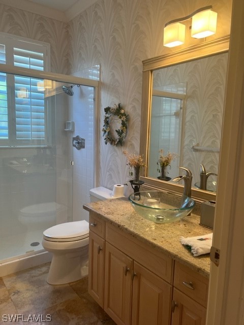 19391 Silver Oak Drive Estero, FL 33967 - Photo 10 of 24 a bathroom with a granite countertop sink a toilet and a mirror