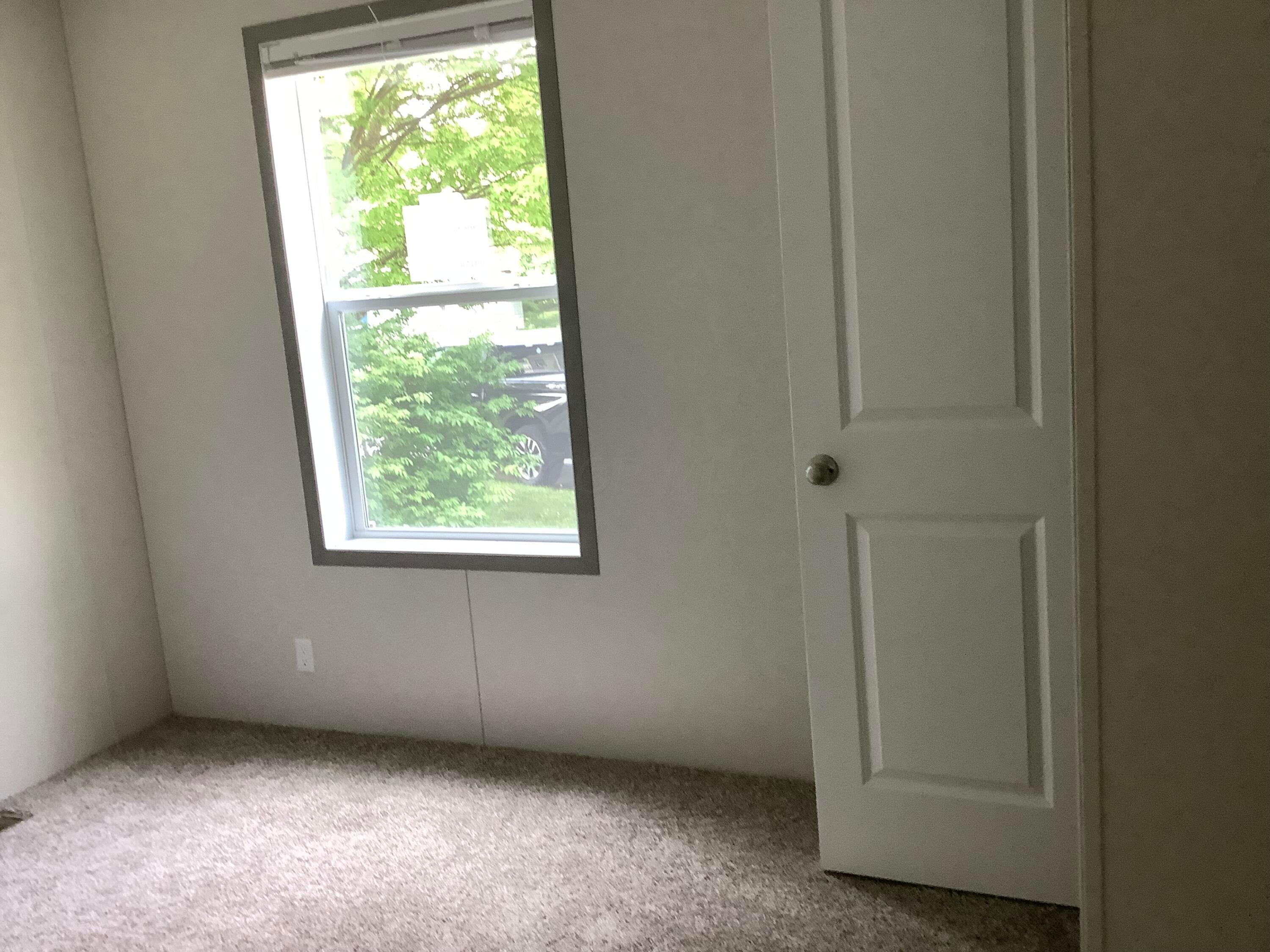 8565 Smith-Calhoun Road, Unit 54R Plain City, OH 43064 - Photo 4 of 14 IMG_5459