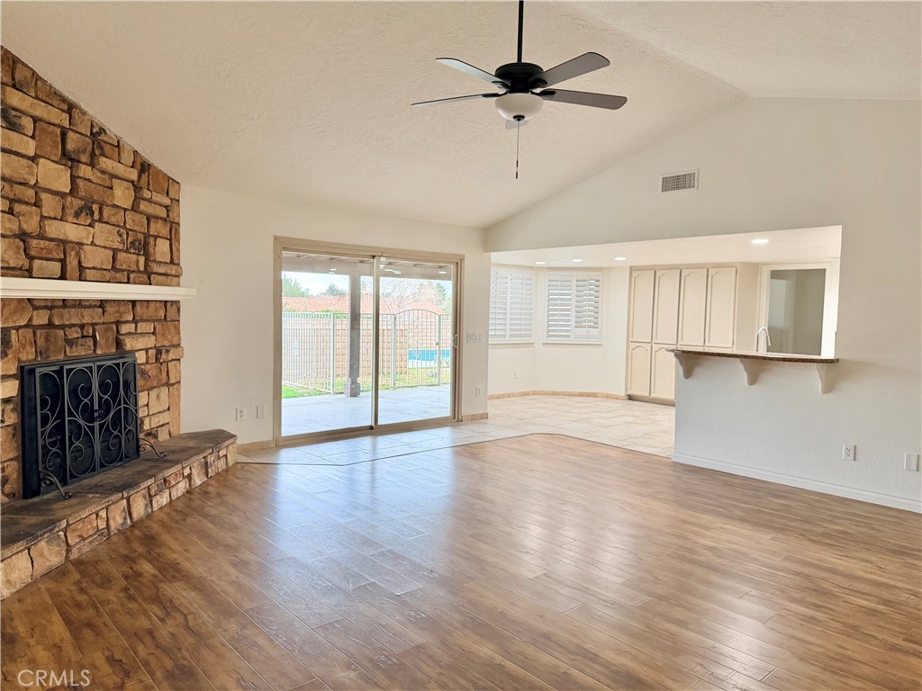 14840 Pamlico Road Apple Valley, CA 92307 - Photo 11 of 39 a view of an empty room with window and wooden floor