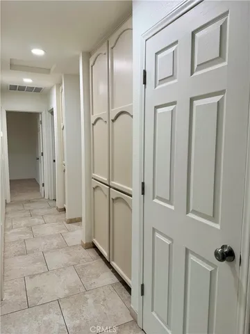 a bathroom with a glass door shower