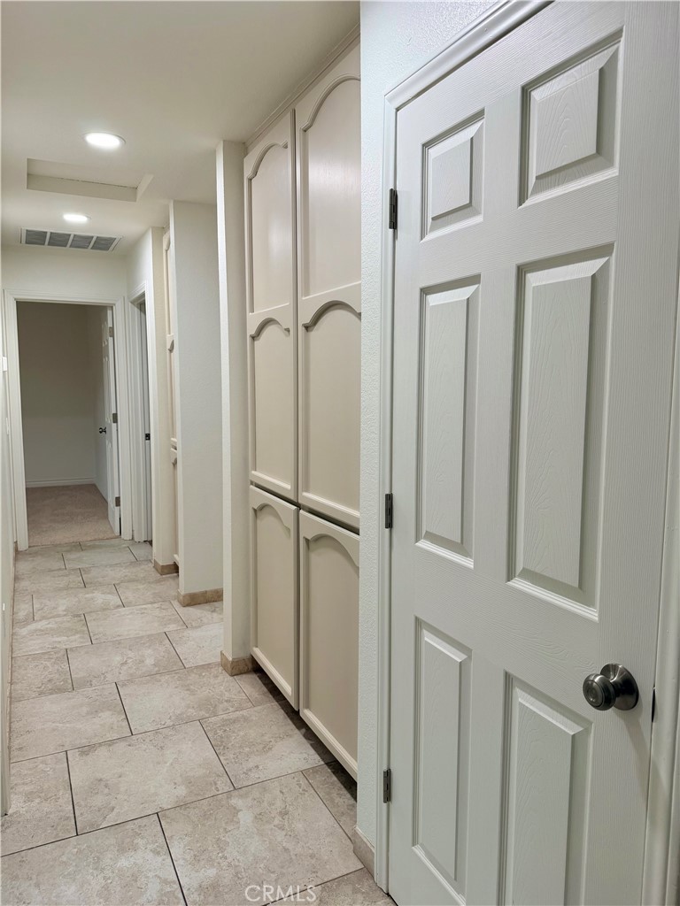 14840 Pamlico Road Apple Valley, CA 92307 - Photo 25 of 39 a bathroom with a glass door shower