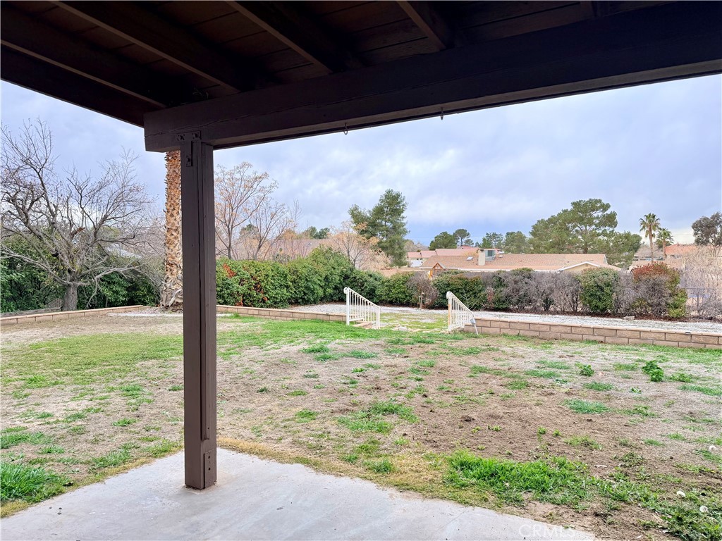 14840 Pamlico Road Apple Valley, CA 92307 - Photo 35 of 39 a view of a yard with an outdoor seating