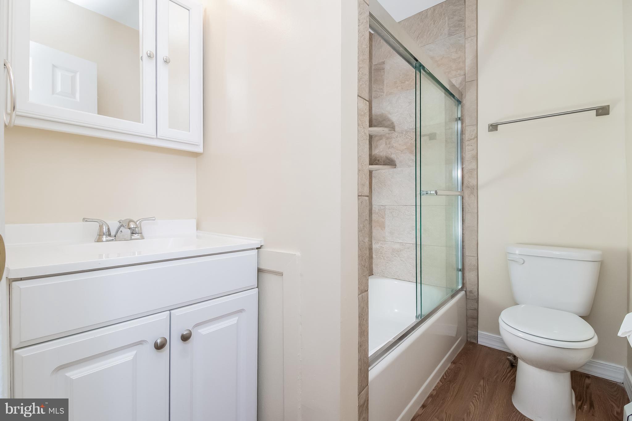 17 A State Road, Unit A Media, PA 19063 - Photo 17 of 19 a bathroom with a sink a toilet and shower