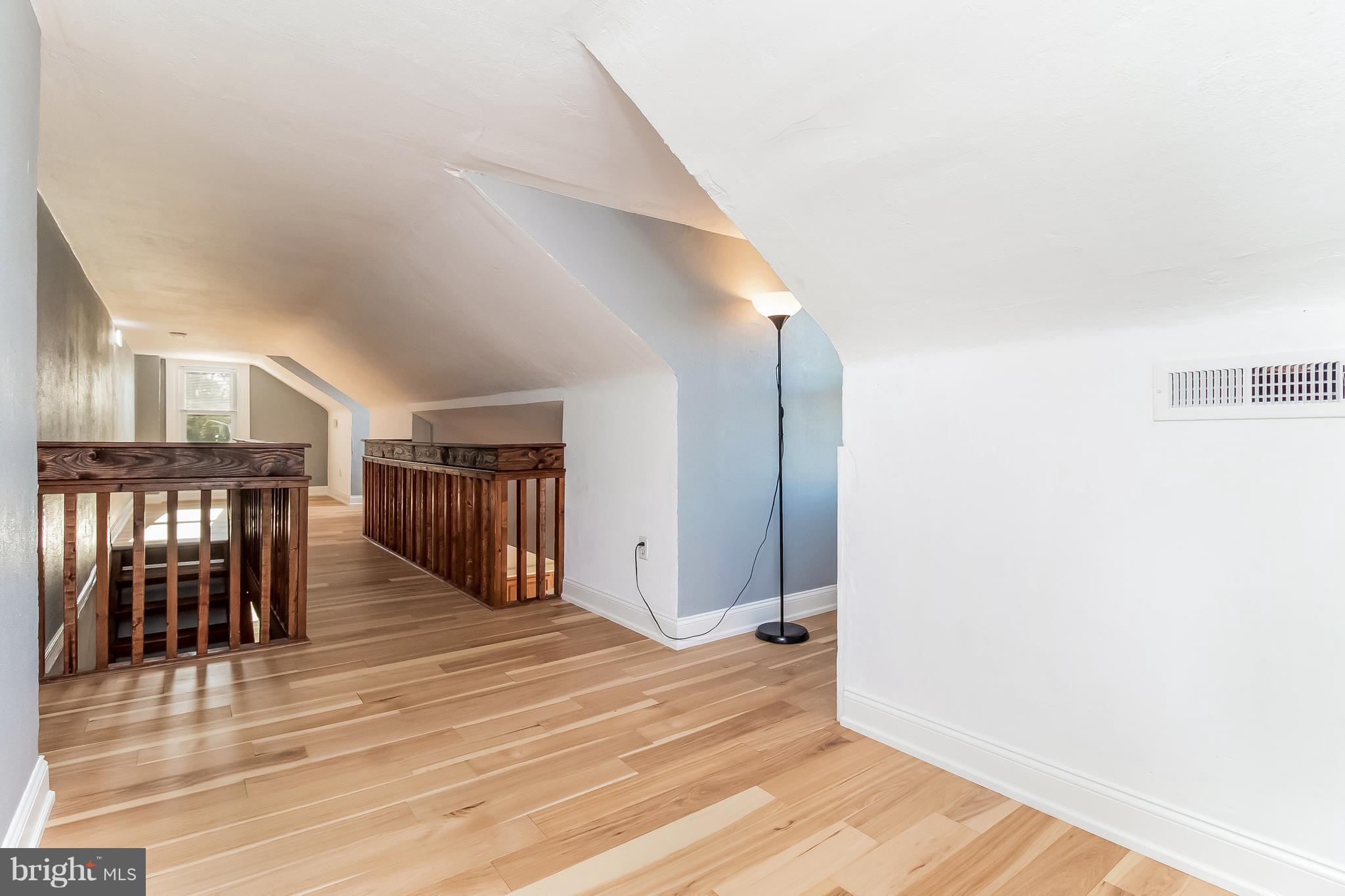 17 A State Road, Unit A Media, PA 19063 - Photo 5 of 19 a view of a hallway with wooden floor and entryway
