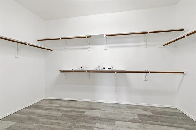 a view of a room with racks on the wall