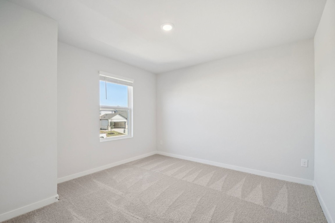 163 Two Bits Lane Elgin, TX 78621 - Photo 15 of 34 an empty room with a window