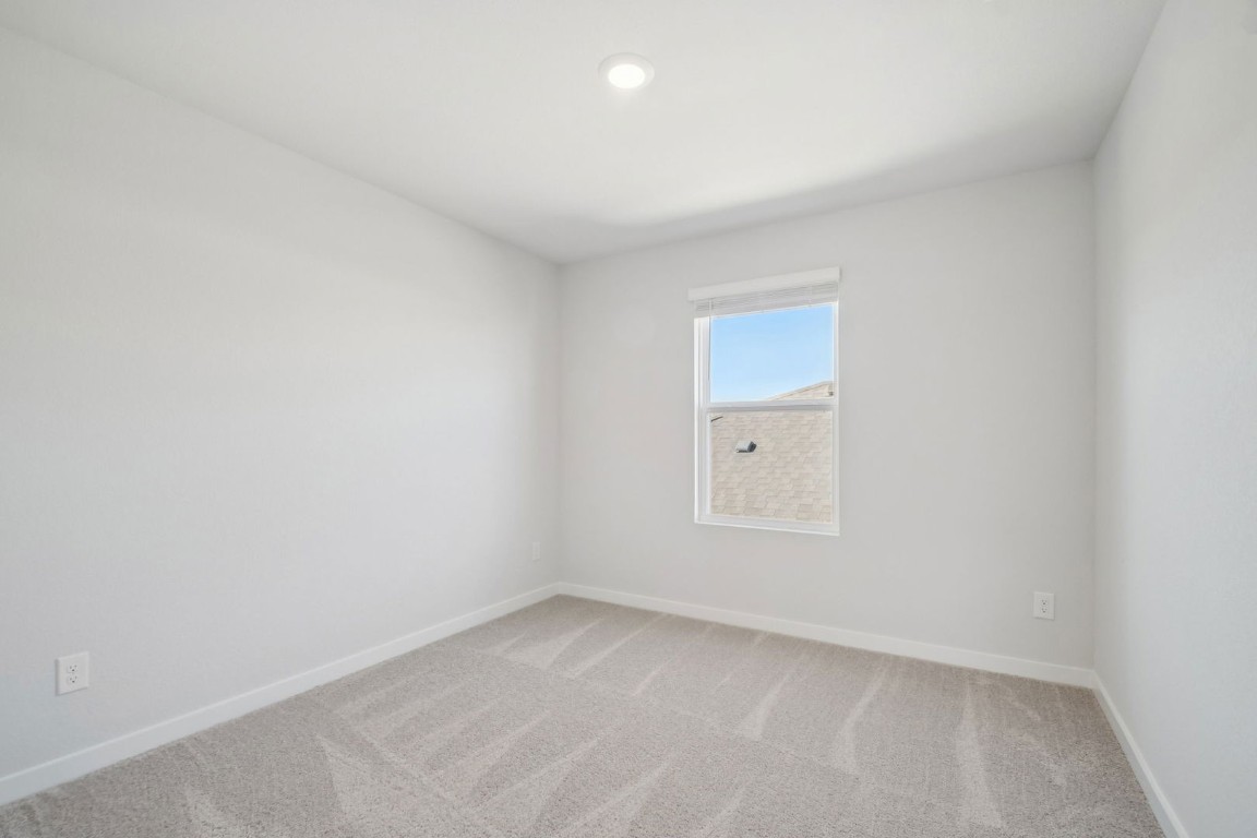 163 Two Bits Lane Elgin, TX 78621 - Photo 20 of 34 an empty room with a window