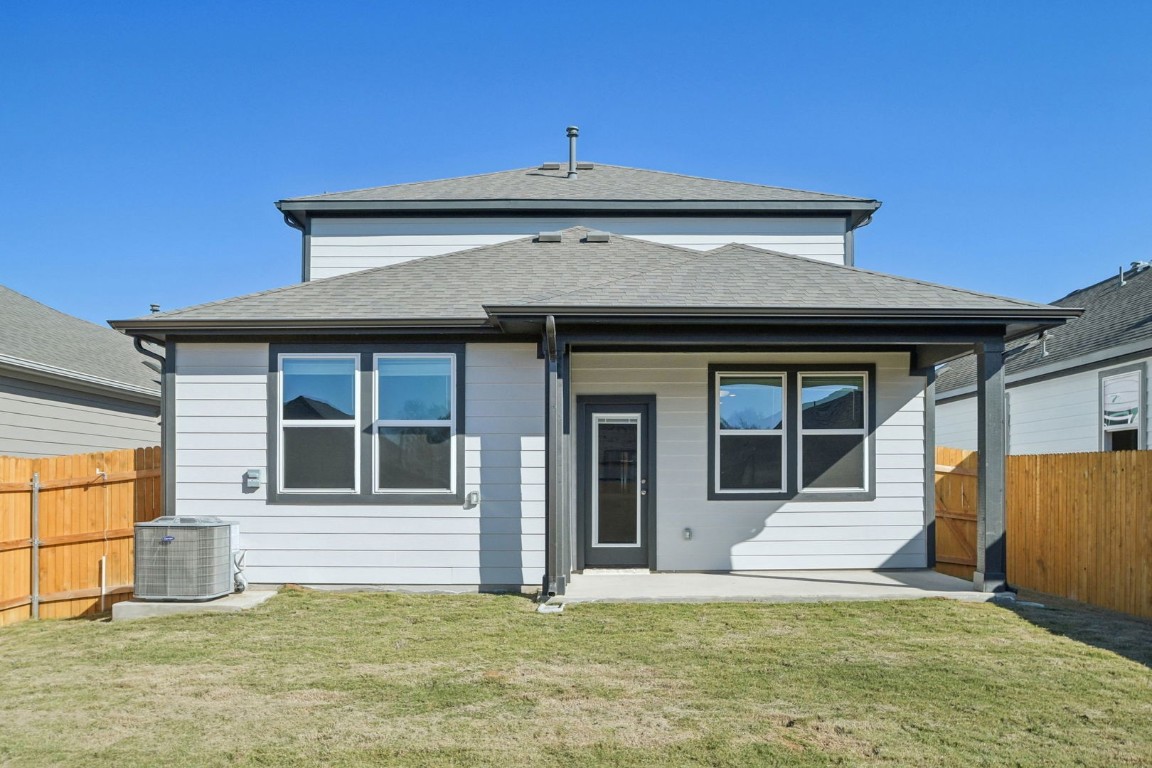 163 Two Bits Lane Elgin, TX 78621 - Photo 25 of 34 a view of a house with a porch