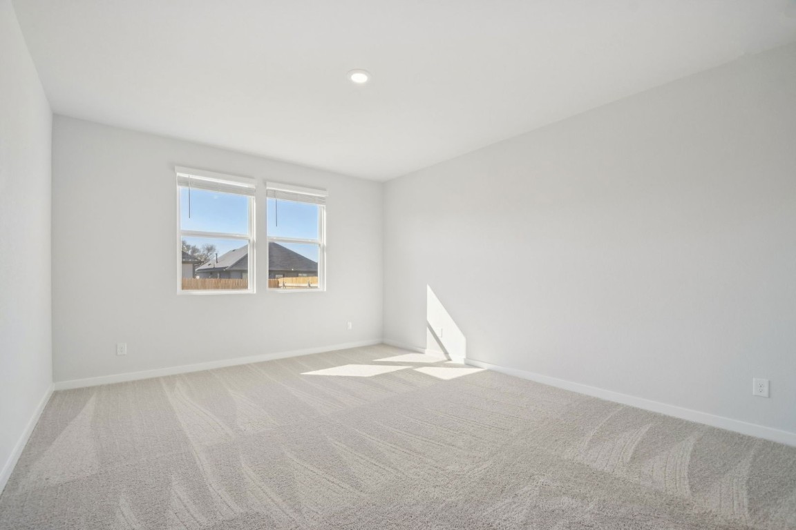 163 Two Bits Lane Elgin, TX 78621 - Photo 8 of 34 a view of an empty room with a window