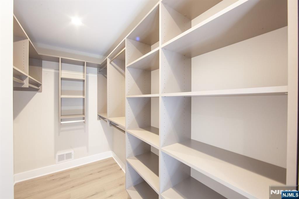 327 Penns Way Bernards, NJ 07920 - Photo 14 of 23 a view of an empty walk in closet