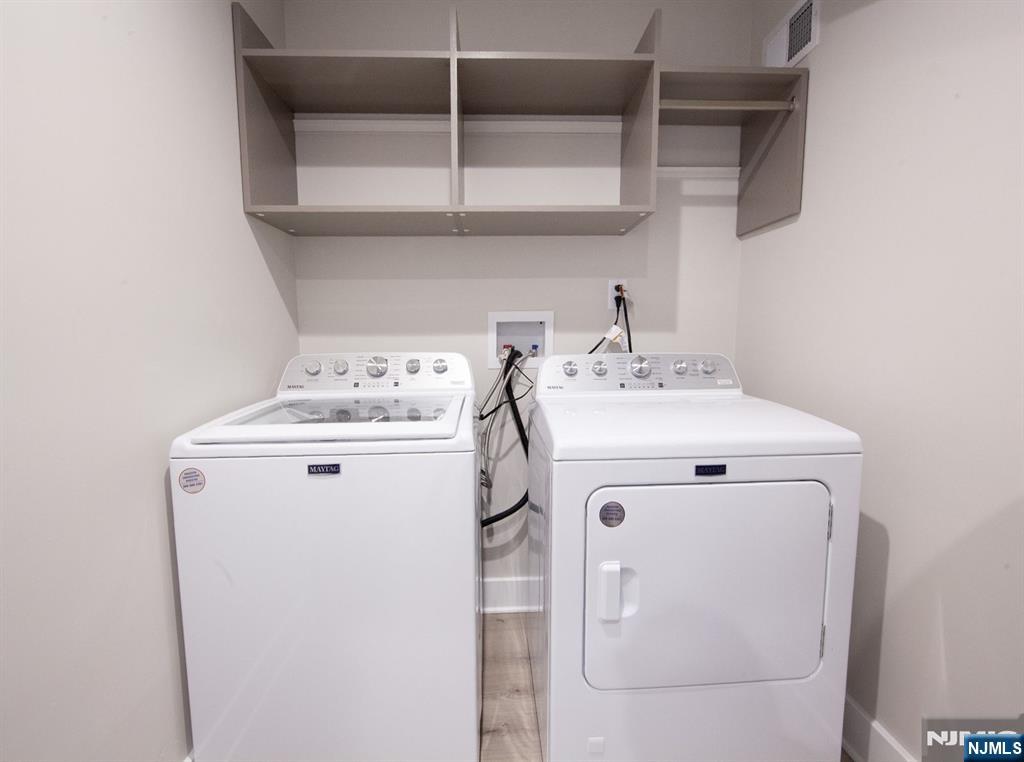 327 Penns Way Bernards, NJ 07920 - Photo 19 of 23 a utility room with dryer and washer