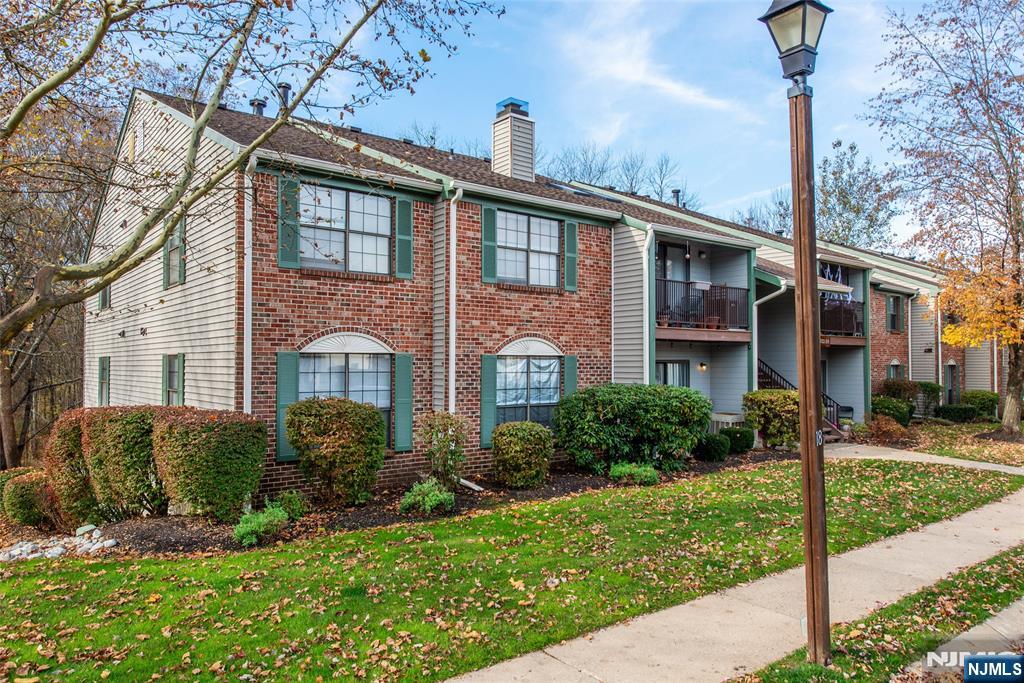 327 Penns Way Bernards, NJ 07920 - Photo 5 of 23 a front view of a house with garden