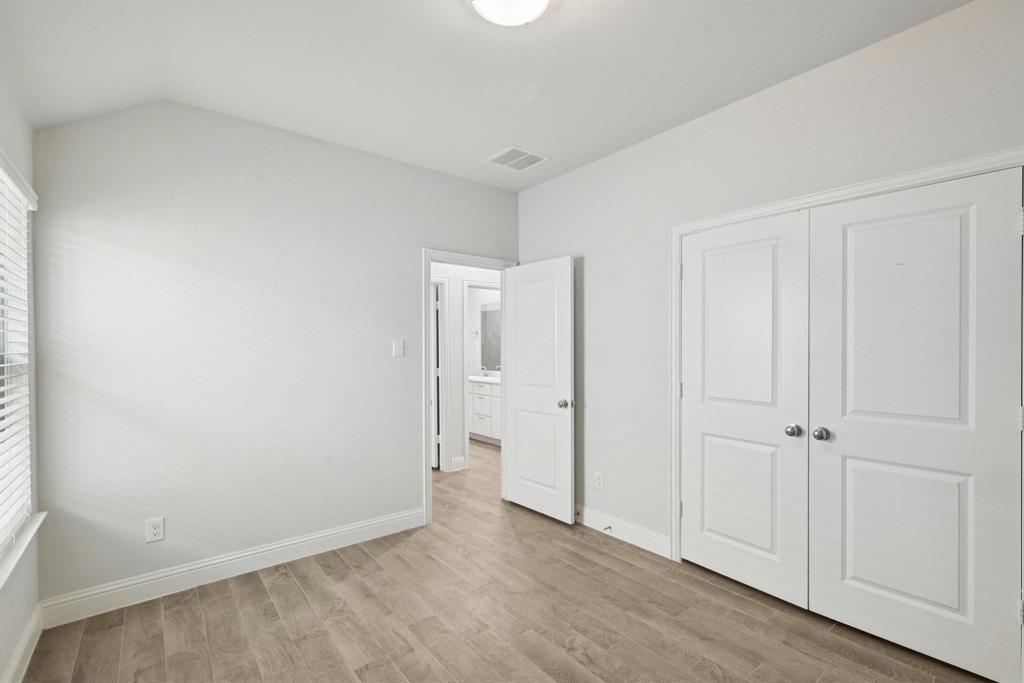 1685 Timpson Drive Forney, TX 75126 - Photo 18 of 36 an empty room with closet area