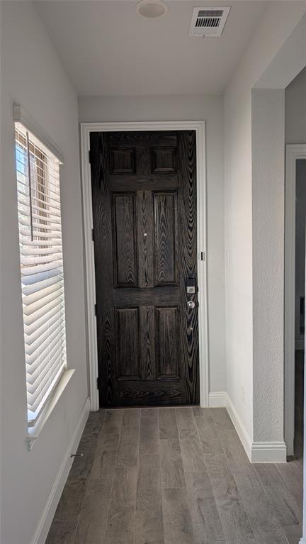 1685 Timpson Drive Forney, TX 75126 - Photo 3 of 36 a view of a closet area with living room