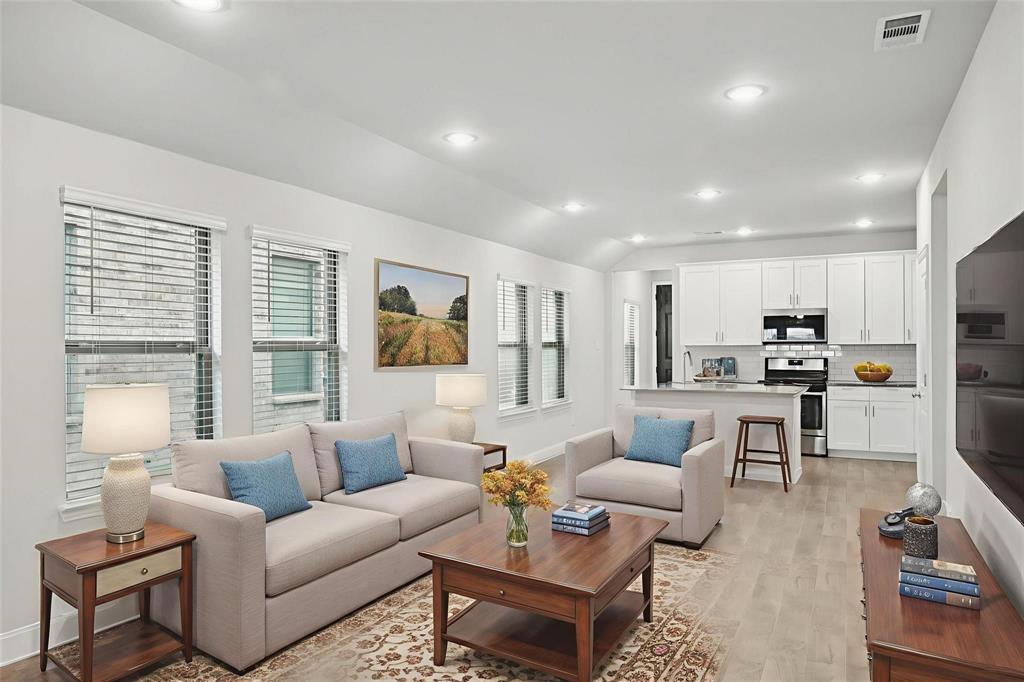 1685 Timpson Drive Forney, TX 75126 - Photo 10 of 36 a living room with furniture and a large window