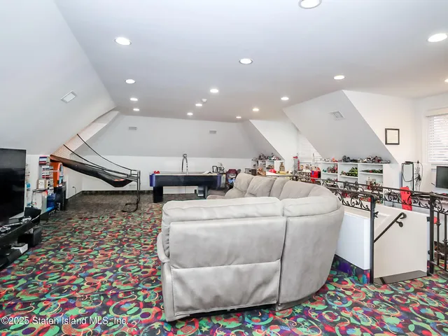 a view of house with swimming pool outdoor seating