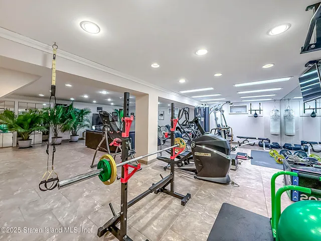 a view of swimming pool with seating space