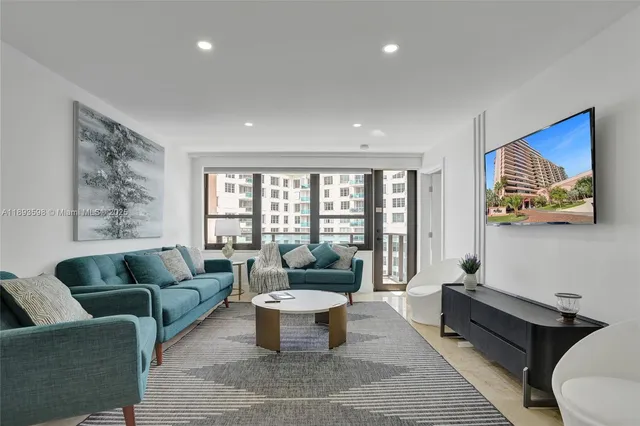 a living room with furniture and a table