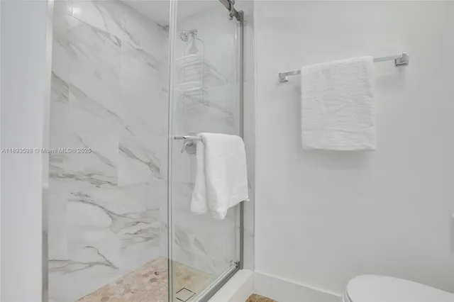 a front view of a building with garden