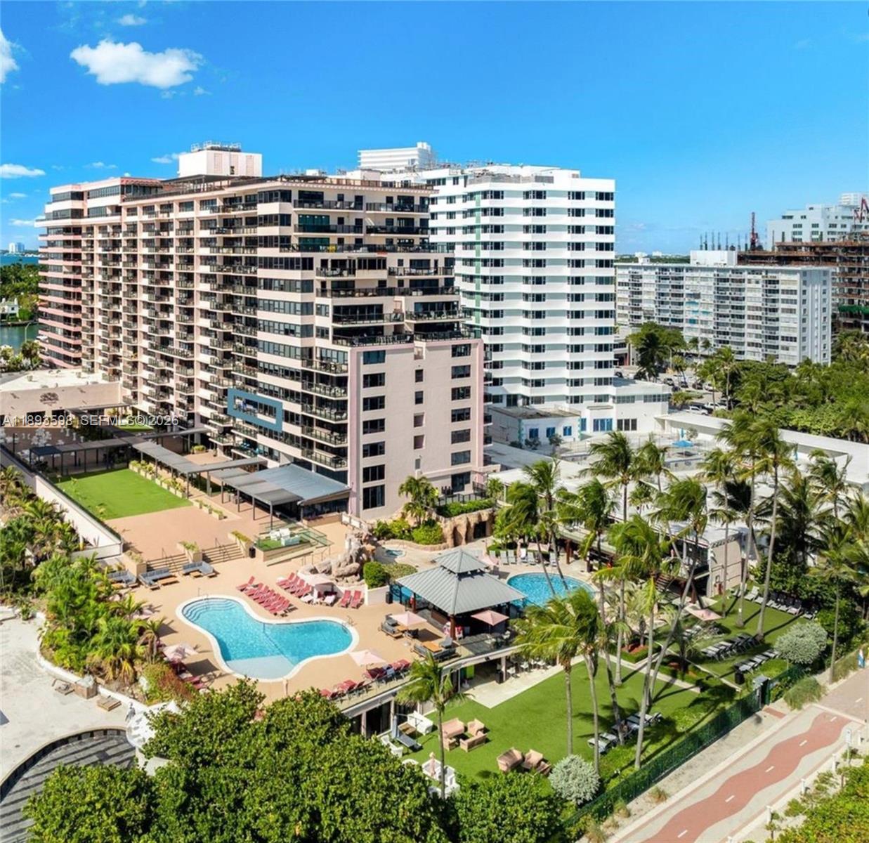 5225 Collins Avenue, Unit 1411 Miami Beach, FL 33140 - Photo 32 of 36 a view of a city with tall buildings