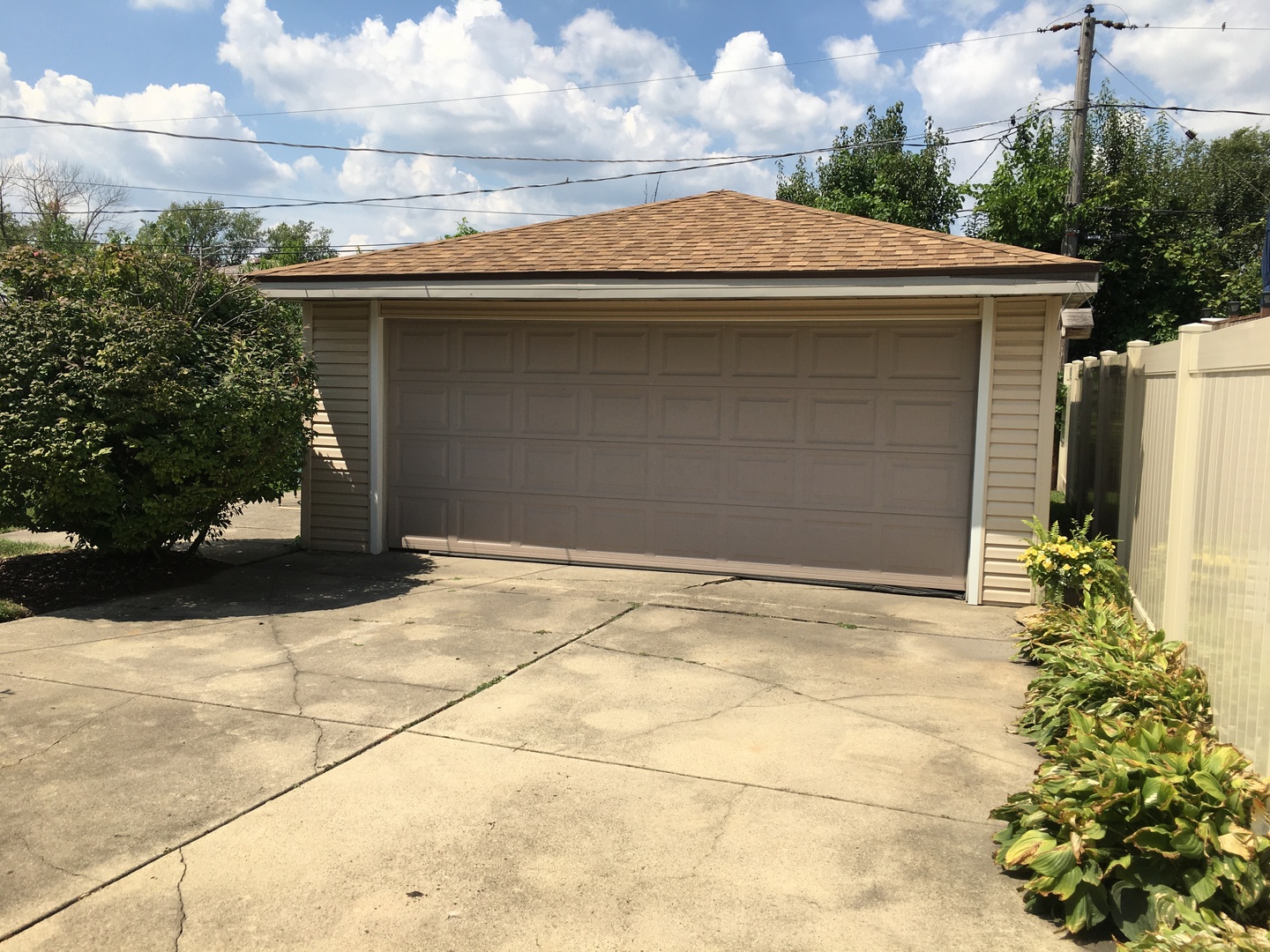 10338 Barnard Drive Chicago Ridge, IL 60415 - Photo 17 of 17 a view of a house with a garage