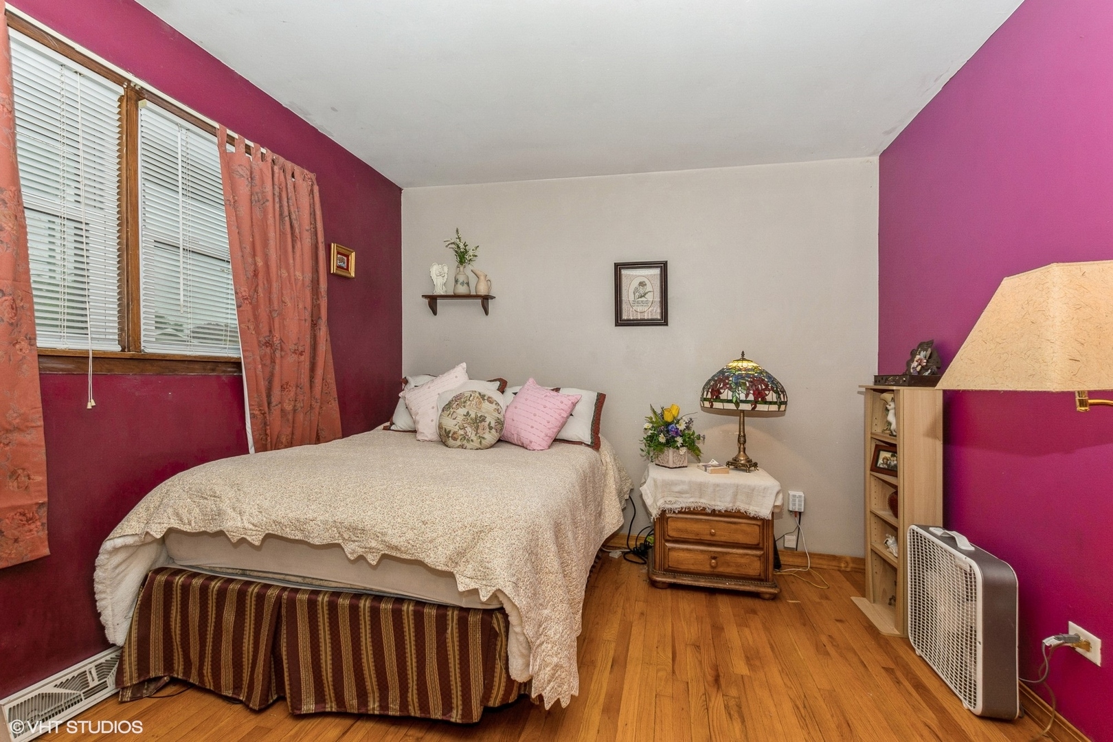 10338 Barnard Drive Chicago Ridge, IL 60415 - Photo 8 of 17 a bedroom with a bed and wooden floor