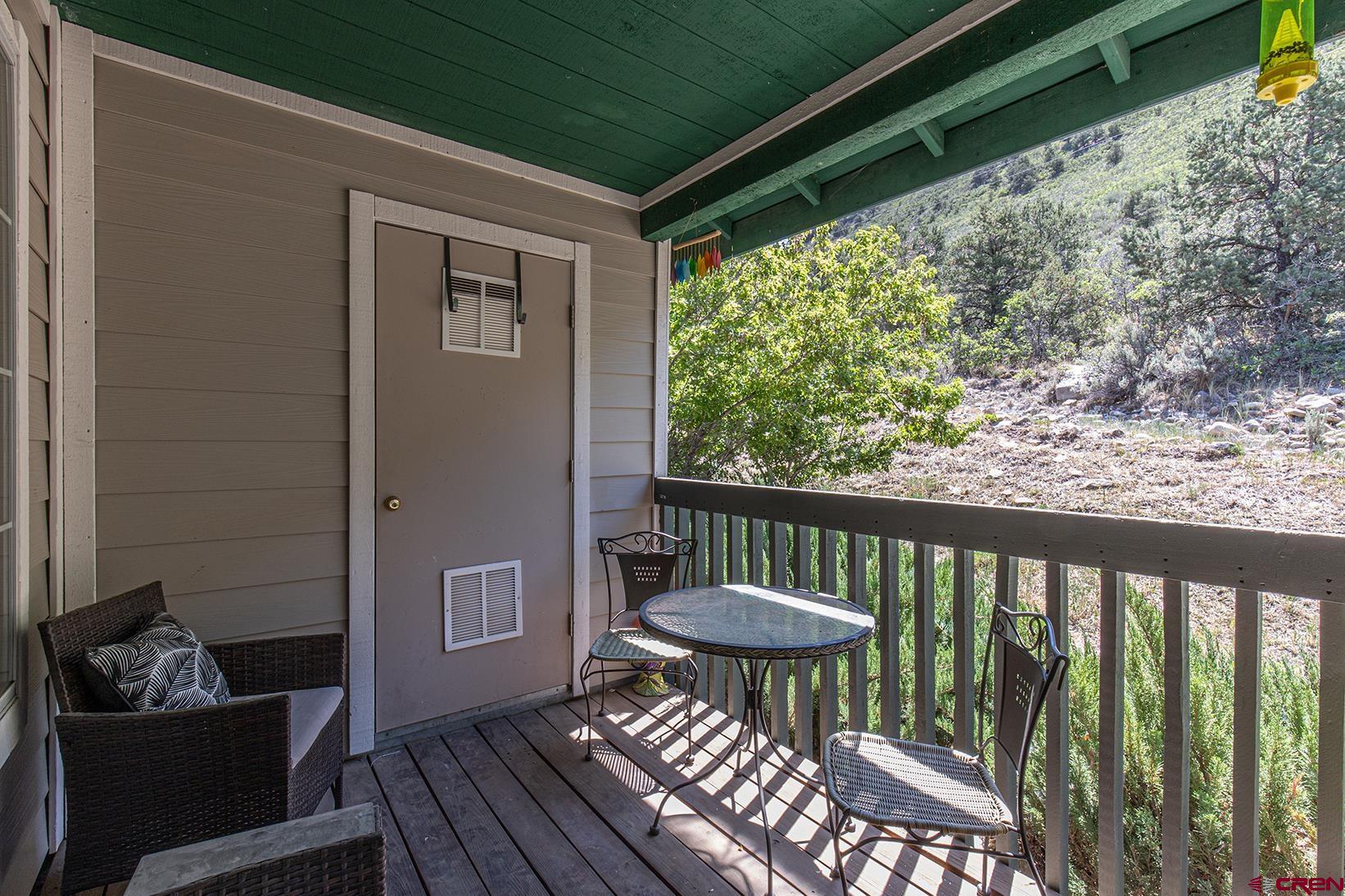 1100 Goeglein Gulch Road, Unit 170 Durango, CO 81301 - Photo 18 of 21 a view of a chair in the balcony