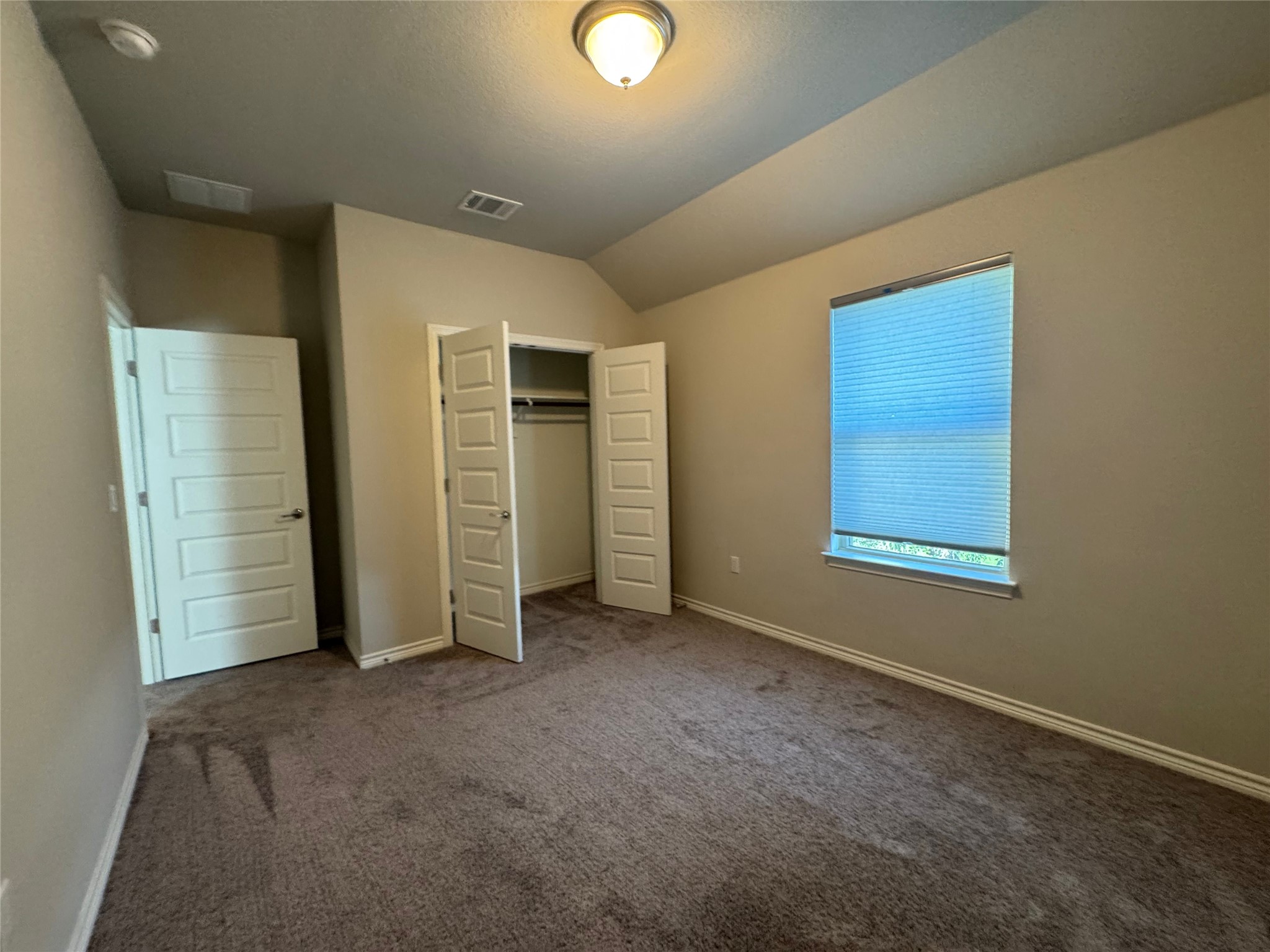 14100 McCoy Loop, Unit 1 Austin, TX 78717 - Photo 26 of 39 Well-lit and versatile, this bedroom provides a comfortable retreat with ample closet space and a window.