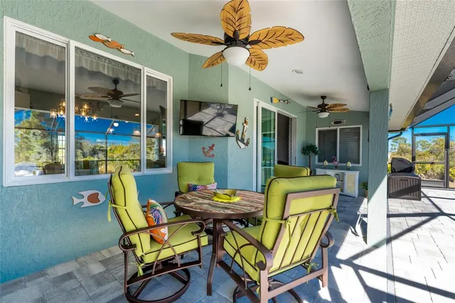 a view of a swimming pool with a patio