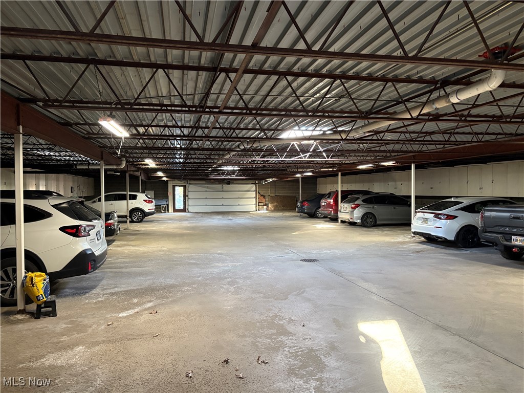 935 Canyon View Road, Unit 104 Northfield, OH 44067 - Photo 37 of 46 Garage featuring metal wall