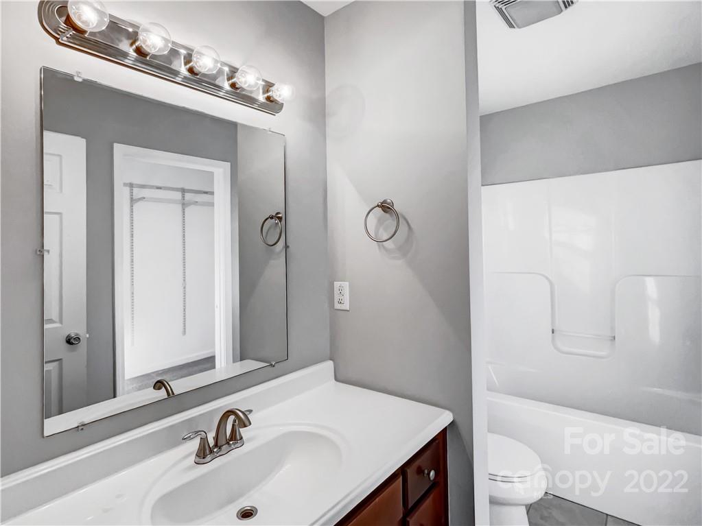 312 Springhill Lane Maiden, NC 28650 - Photo 16 of 18 a bathroom with a sink and a mirror