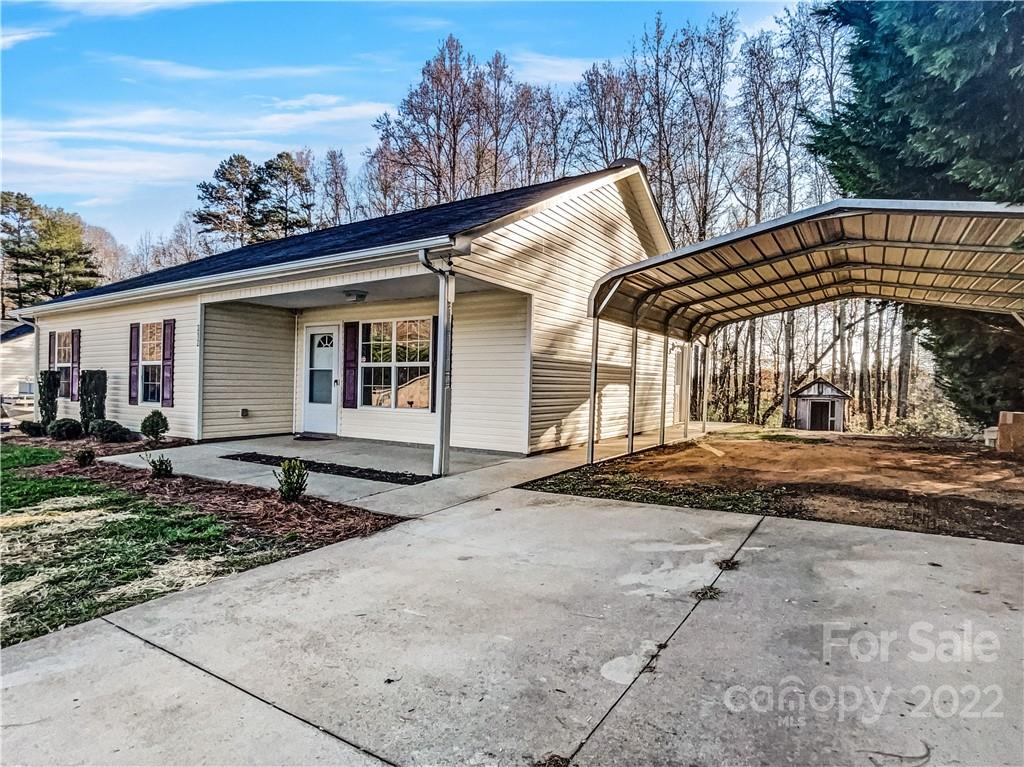 312 Springhill Lane Maiden, NC 28650 - Photo 17 of 18 a front view of a house with a yard