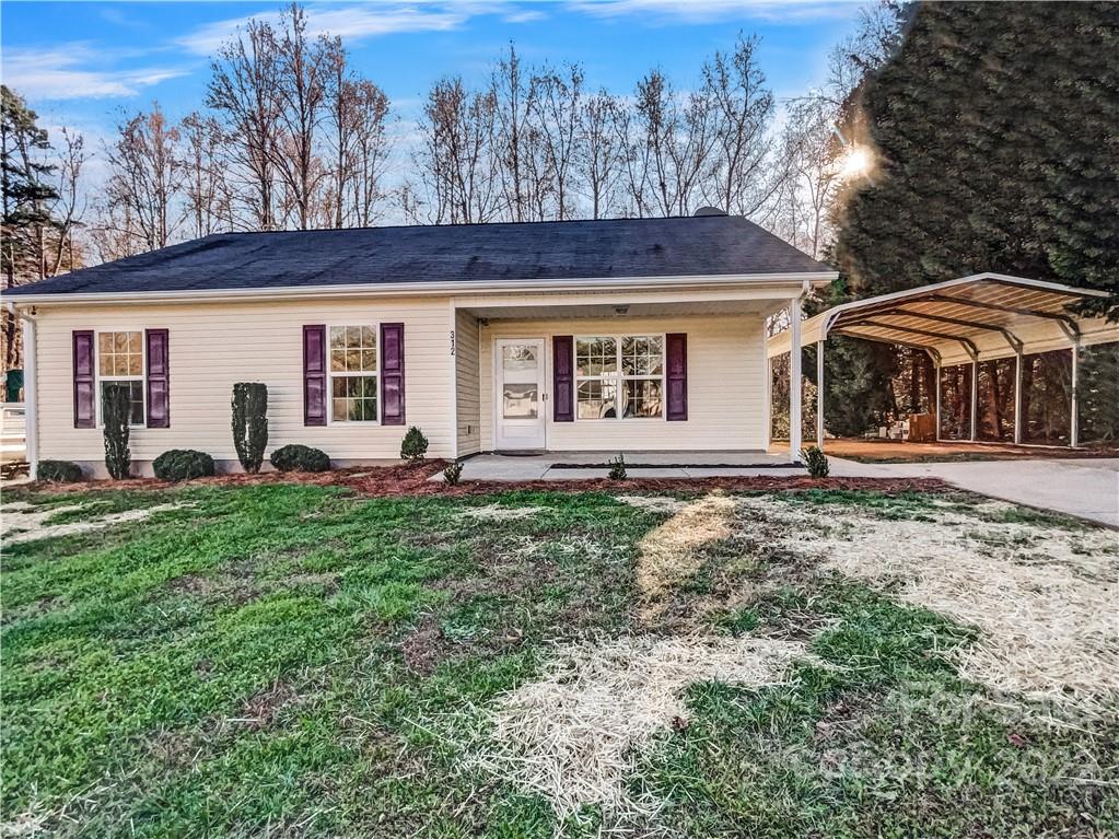 312 Springhill Lane Maiden, NC 28650 - Photo 2 of 18 a front view of a house with garden