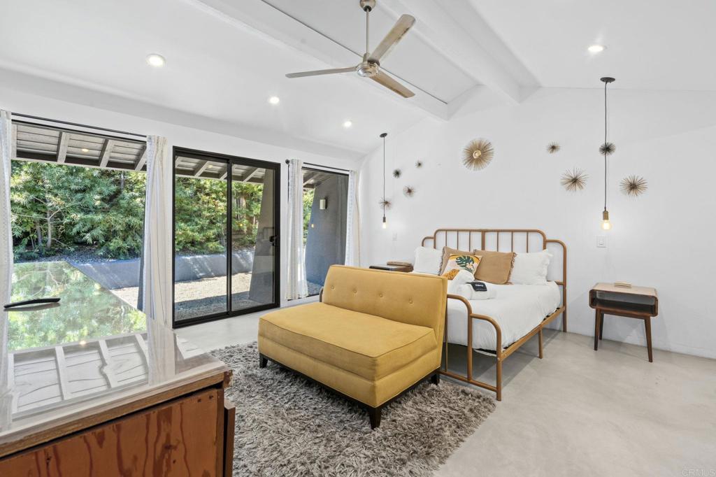 754 El Rancho Drive El Cajon, CA 92019 - Photo 22 of 55 a bedroom with furniture and a large window