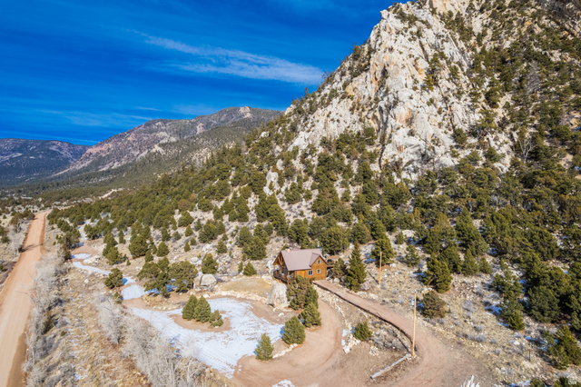 18906 North Canyon Road Whiterocks, UT 84085 - Photo 61 of 65 Drone / aerial view of a mountain backdrop