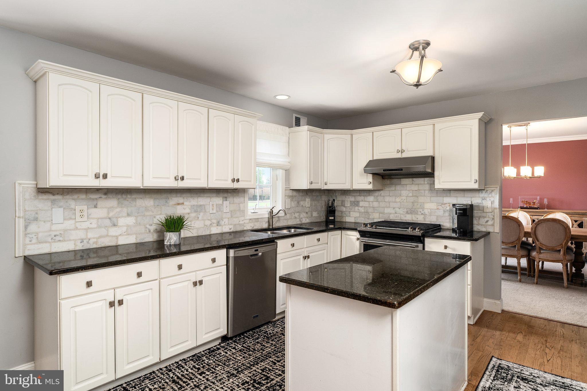 27 Andover Way Hamilton, NJ 08610 - Photo 7 of 30 Updated kitchen with island and breakfast nook