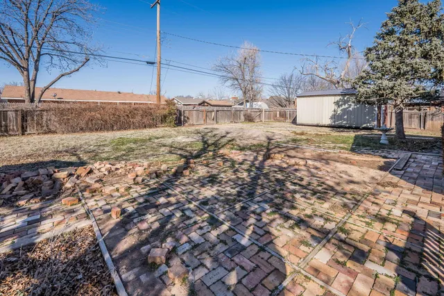 a view of a yard with a snow