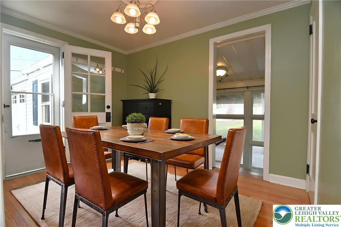915 Birch Road Hellertown, PA 18055 - Photo 7 of 32 a view of a dining room with furniture window and wooden floor