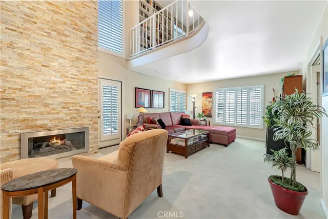 a bedroom with furniture and a flat screen tv