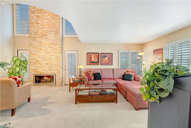 a bedroom with a bed and a television