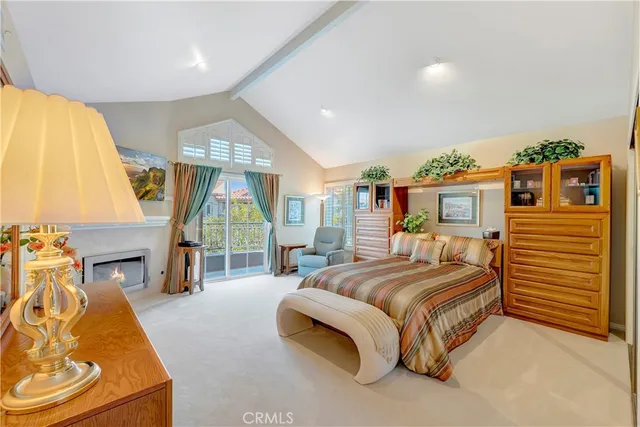 a bedroom with furniture and a bed