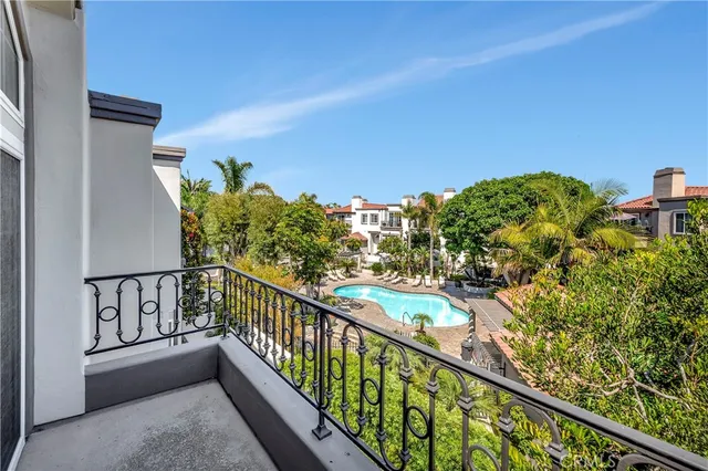 a spacious bathroom with a granite countertop tub sink a mirror a shower and vanity