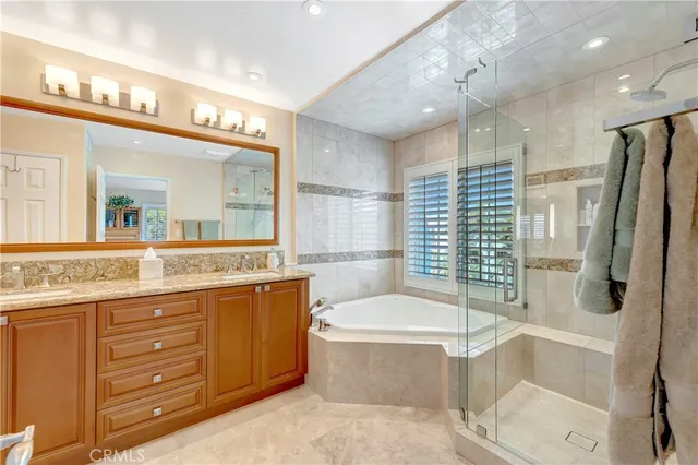 a living room with furniture and a book shelf